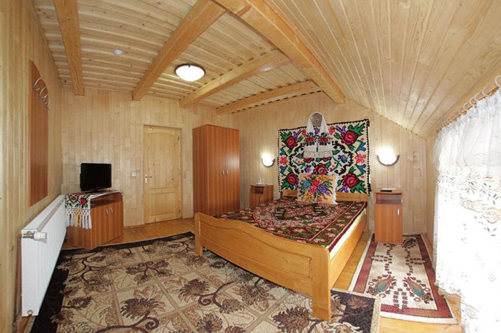 Pensiunea Sub Cetate La Matei Onceşti Habitación foto